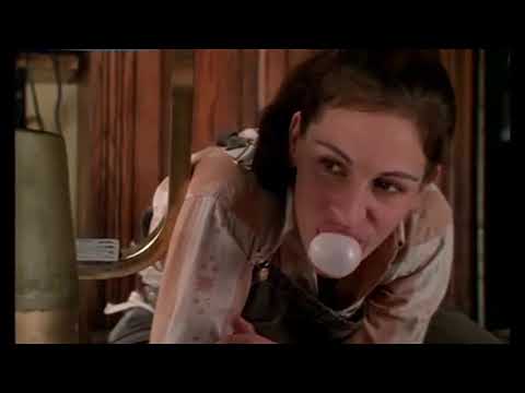 Trailer close-up — Ike and Maggie in a near-kiss while strings settle on a tender cadence