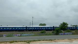 preview picture of video 'Train passing by Hyderabad - Warangal Highway '