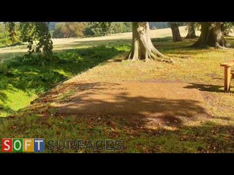 Brown and Green Rubber Mulch Bench Surround in Birmingham, West Midlands | Rubber Surfacing