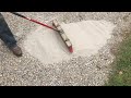 Brushing CHEAP Concrete Onto A Gravel Driveway Adding Strength And Resilience