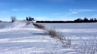 preview picture of video 'Jumping drifts in southern mn with Polaris snowmobile.'