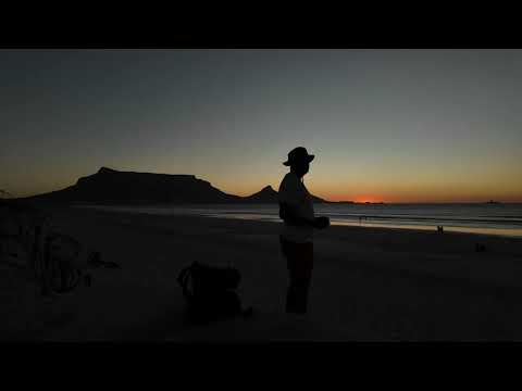 Things to do in Capetown. Milnerton light house: wind, sand, sunset walk and turn.