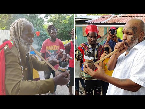 Mike Tyson Enjoys A Smoke With Rastafarian Elder in Antigua