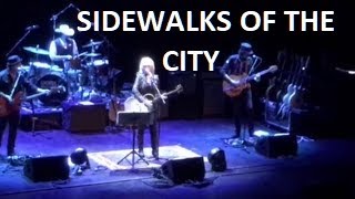Lucinda Williams - SIDEWALKS OF THE CITY - Heart-stirring. She emotes empathy