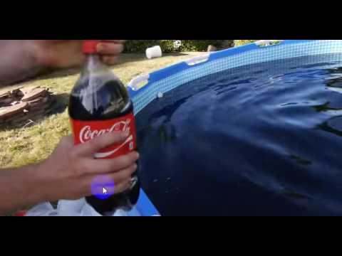 Taking a bath in a Giant 1,500 Gallon CoCa Cola Swimming Pool