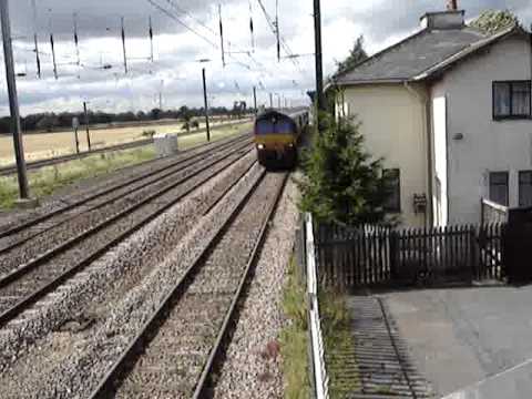 class 66 EWS convoy at Hurn Crossing with mighty tones.