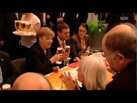Angela Merkel gets a beer and takes it cool (Funny)