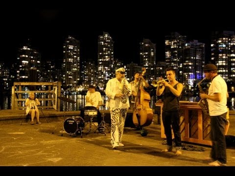 Outdoor pianos for Vancouver: The Carnival Band's Ross Barrett jamming with the Carlo Rossi Gang