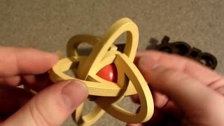 AliExpress Package: Glasses, Tetris, Atom, and Cage Kong Ming Lock Puzzles