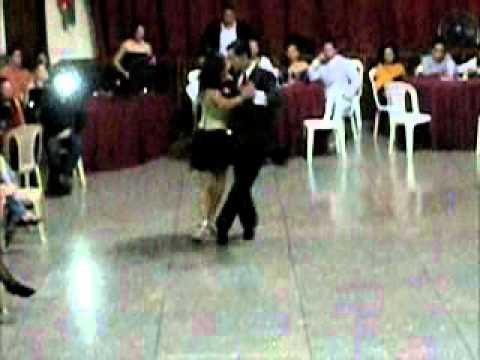  Angela Meléndez  and  Yumar Lugo  are  dancing  to  the  tango  "  Mi Dolor  "