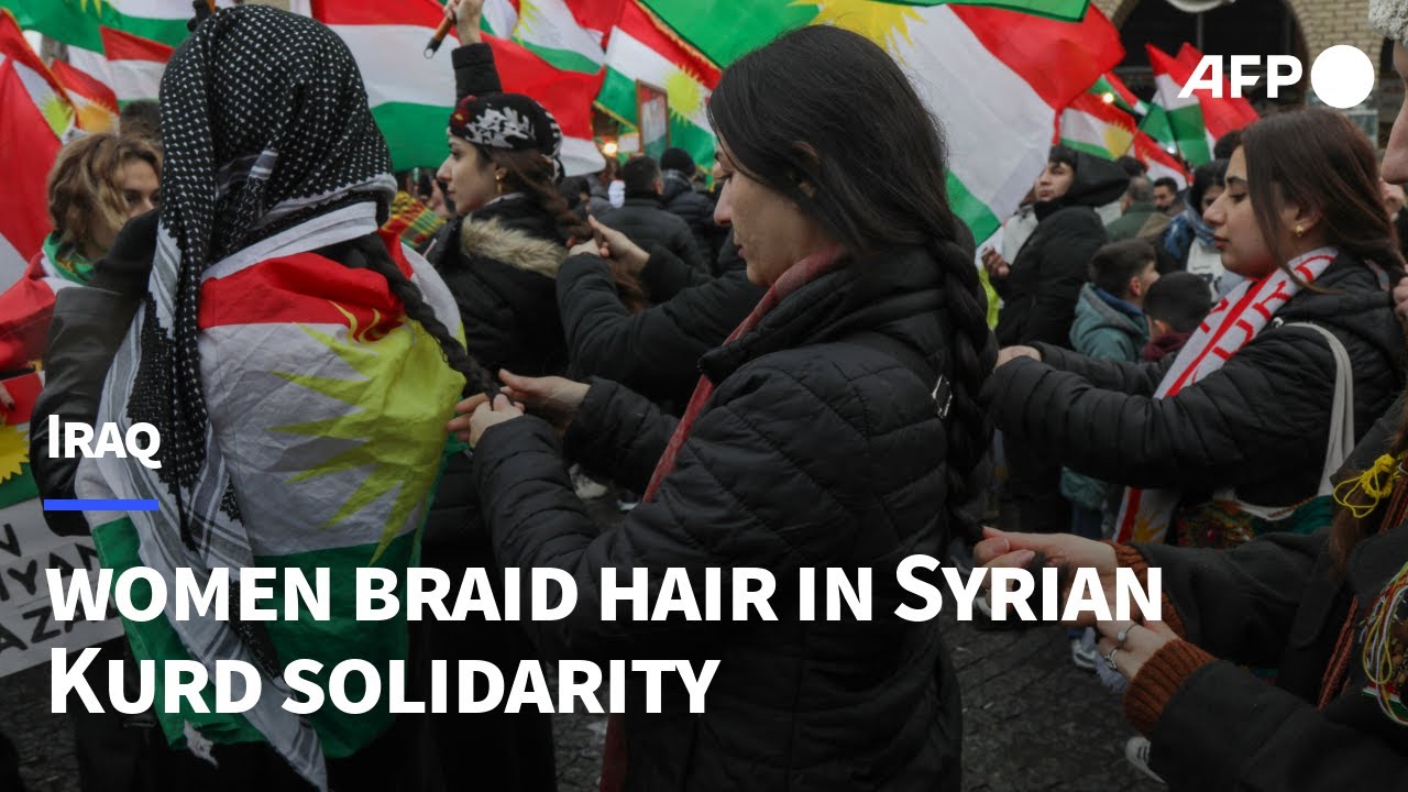 Video | Iraqi Kurdish women braid hair at protest in solidarity with Syrian Kurds | AFP