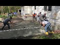 Basement Systems of New York Installing A New Concrete Patio Slab with a Retaining Wall and Stairs