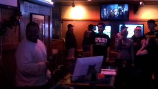 Black man sings sweet home Alabama.