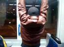nikola tosic doing pullups in amsterdam tram