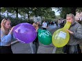 Girls Blowing Balloons At Public Festival Part 5 Preview