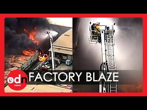 Dramatic Aerial Footage of Brisbane Recycling Warehouse Engulfed By Massive Blaze