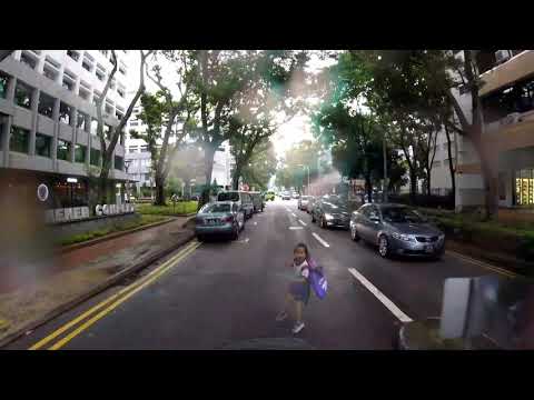 Close call for pedestrian and motorcyclist