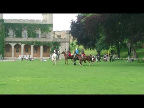 Knights on horses battle for supremacy in a medieval tournament at Lincoln Castle