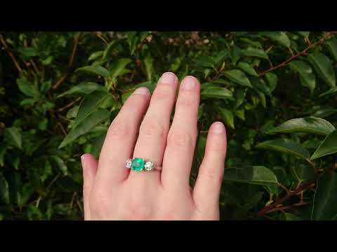 A stunning 18ct white gold emerald & diamond trilogy ring