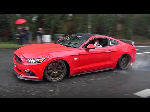 Supercars Leaving a Car Show in the Rain - January 2017