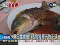 中國大陸殘忍料理:  吃半活魚、嘴巴還會動，只有魚身炸熟，魚頭還在痛苦掙扎