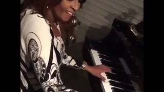 Dorinda Clark Cole playing piano