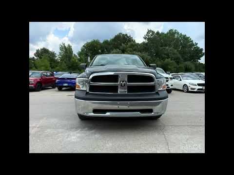 2011 Ram 1500 4WD Quad Cab 6.4 Ft Box ST in Black for sale at Finch Chrysler Dodge Jeep Ram Ltd in London, ON