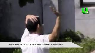 Man Jumps Into Lions' Den To Offer Prayers