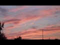 Розовый закат Луна в небе 