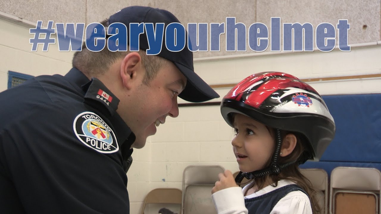 Bike Helmet Giveaway at St.Francis Xavier Elementary School