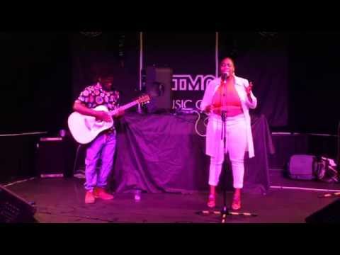 Miss Fire singing her own song 'Crazy' with Calvin on Guitars