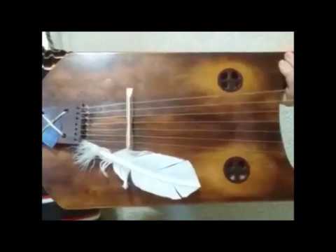 Feather playing technique on an Anglo Saxon lyre.