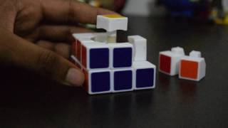 How to take apart and put together a 3x3 Rubik's Cube (Fast and Easy)