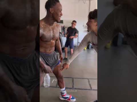 Boxer tries to take a leg kick