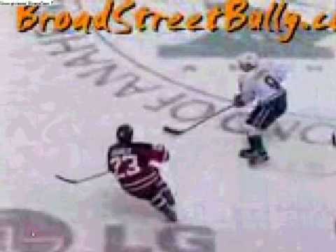 Scott stevens hits paul kariya