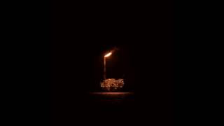 The Delines-The Oil Rigs at Night.