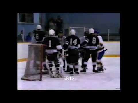 Steve Schaefer (Winnipeg South Blues) punches Todd Moffatt (Neepawa Natives) 1990-91 (MJHL)