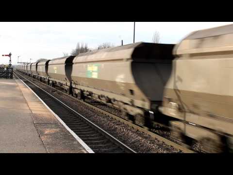 Freightliner class 66507 hauls a rake of empty HHA coal wagons