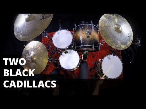 Two Black Cadillacs | Garrett Goodwin