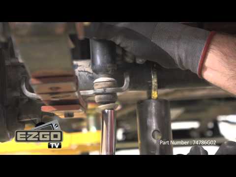 Part of a video titled How to Install an EZGO Lift Kit Installation - Lifting a Golf Car