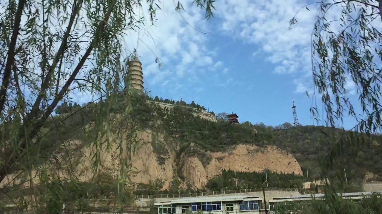 Immersive street-level walking tour through Yan An Baota, China, showcasing authentic urban landscapes, local architecture, and the vibrant atmosphere of the city's neighborhoods