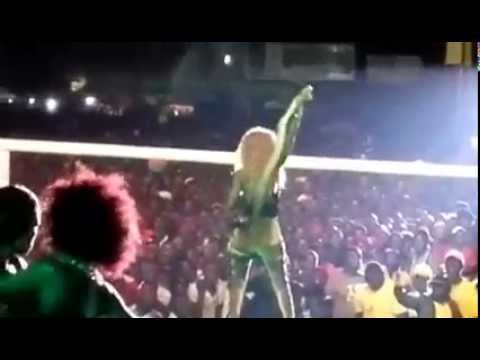 G-Snake dances with snake on stage at Ekiggunda Kyomwaka