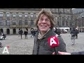 Klimaatactivisten liggen voor dood op de Dam