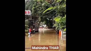 red  #mahindra #thar in heavy#rain । #tharlover 