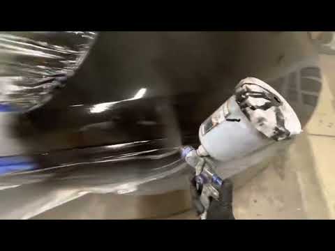 Automotive paint applying base coat black and clear coat satisfying