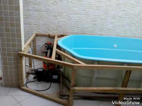 Construção de piscina com deck de Cambará tratado