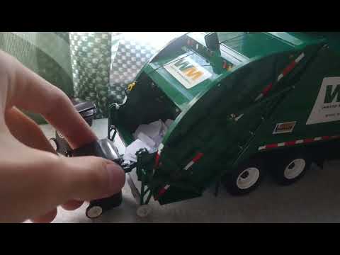 First gear Freightliner M2 McNeilus rear loader in action