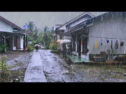 Walk in the pouring rain in a remote mountain village in Indonesia, The sound of rain