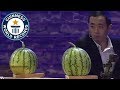 Most playing cards thrown into watermelons in one minute - Guinness World Records