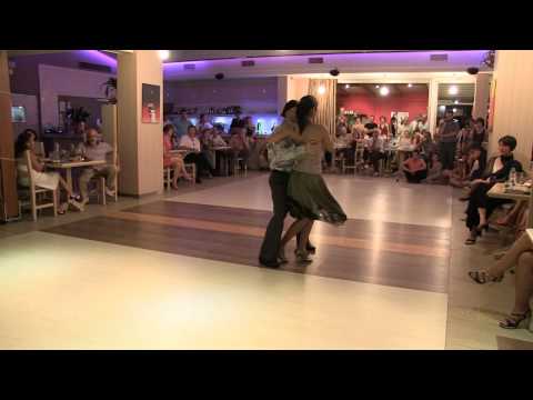  Cristina Ladas  and  Homer Ladas  are  dancing  to  a  nontraditional song  at  Sunny Tango Festival  in  2012